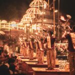 A captivating night scene of the Ganga Aarti ceremony on the riverbank in Varanasi, India.